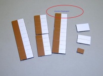 Magnetsymbol für Stundenplan, halb braun-halb weiß Magnetsymbol für Stundenplan, halb braun-halb weiß