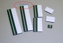 Magnetsymbol für Stundenplan, halb dunkelgrün mit Streifen-halb weiß